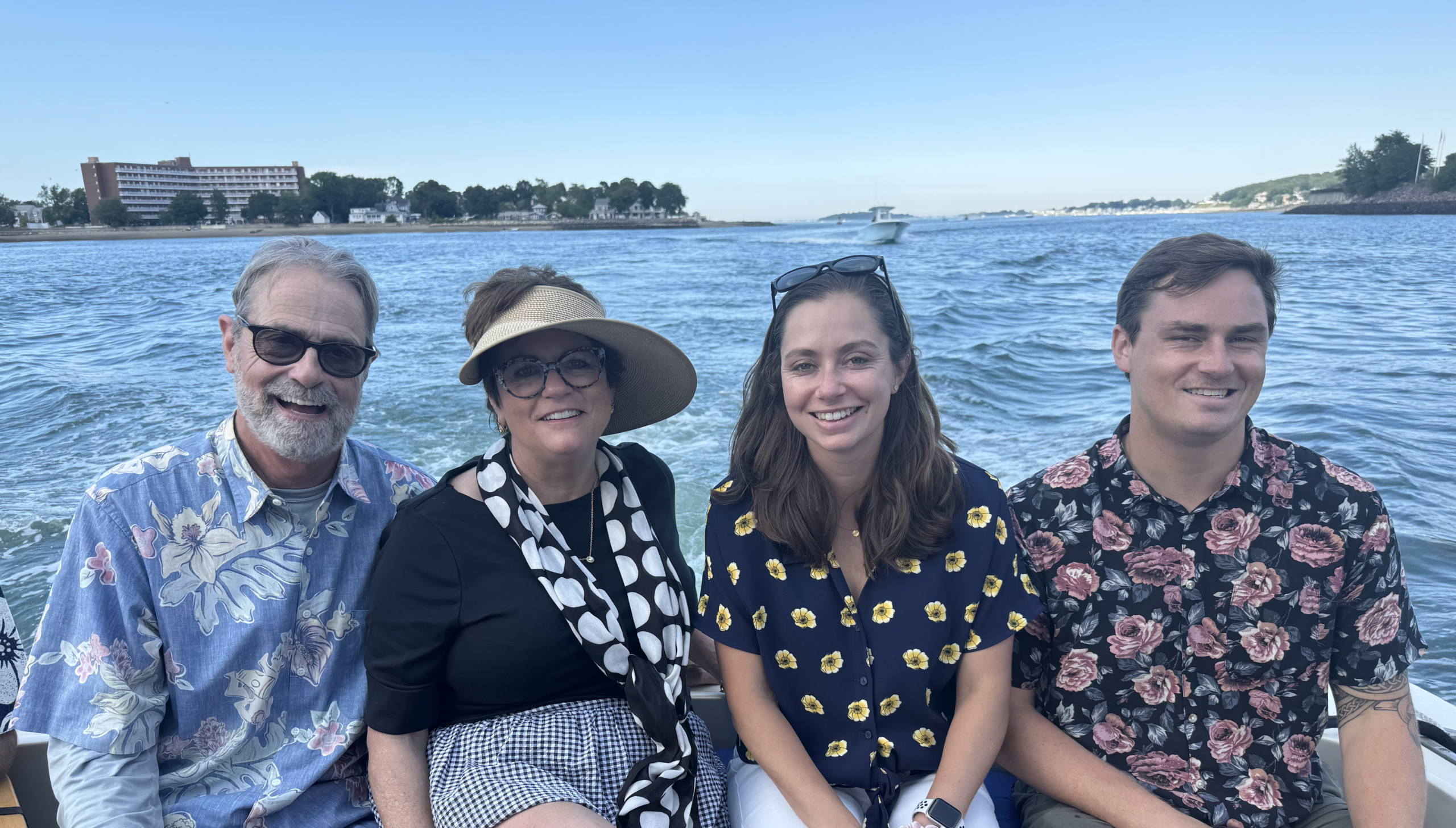 Theresa, Craig, and their two adult children, Kaelin and Sean, enjoying time together on the water.